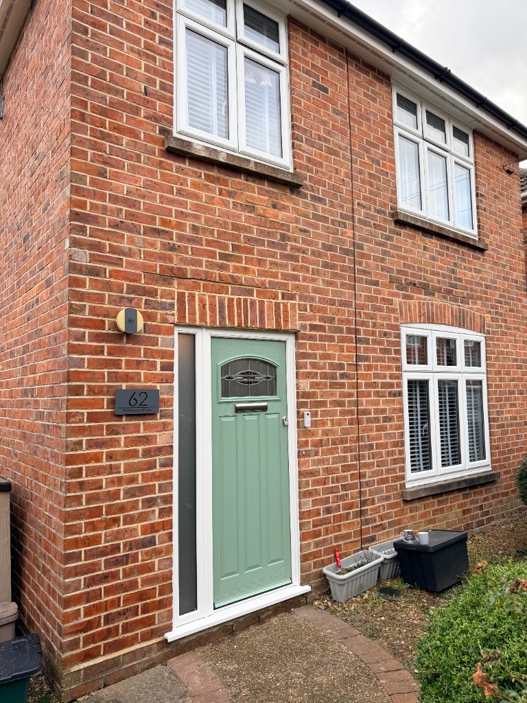 62 Parkwood Road, Wimborne — three-bed detached family home, brick frontage with new composite front door and the original number plate.
